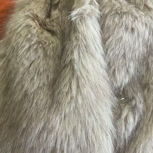 Woman’s faux fur jacket size L  color is as you see mixed beiges .